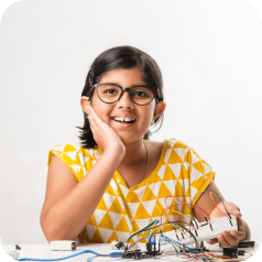 Student with electronics kit